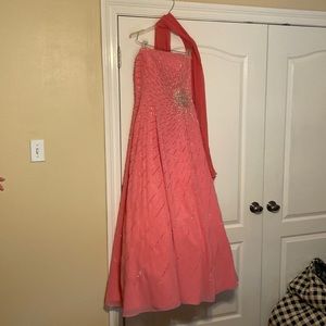 Gently used strapless ball gown. Only worn once!